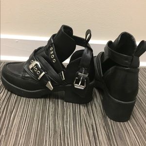 Black buckle ankle cut out combat booties